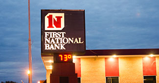 Exterior picture of First National Bank sign.